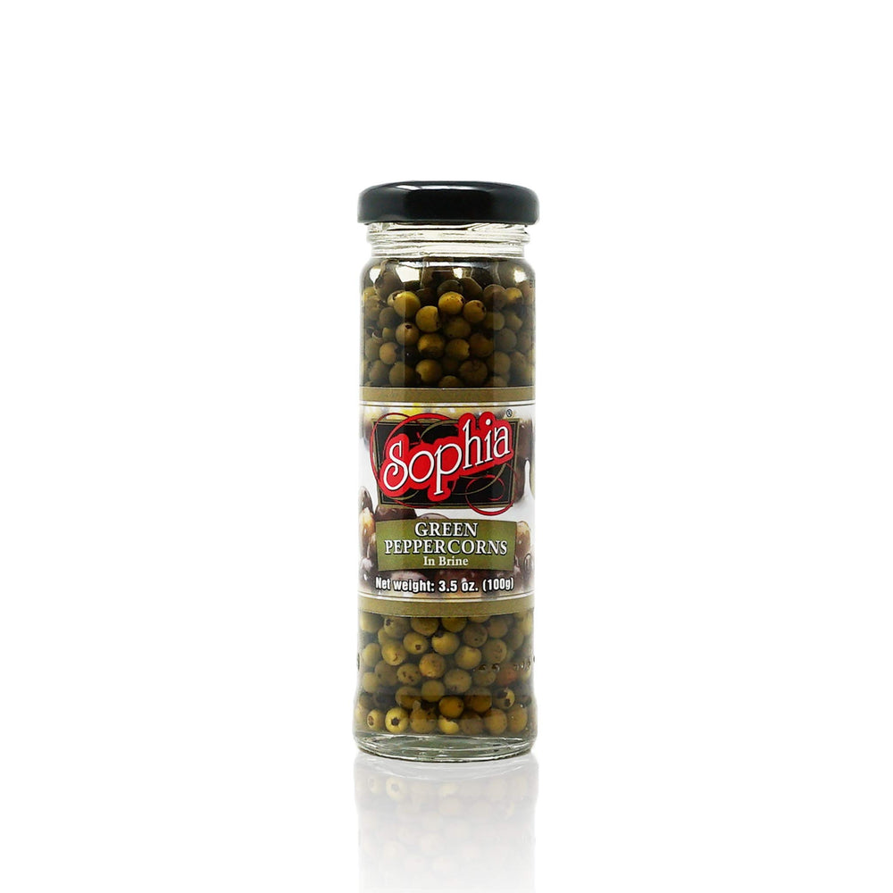 Sophia close-up of green peppercorns texture in brine, highlights soft pickled bite