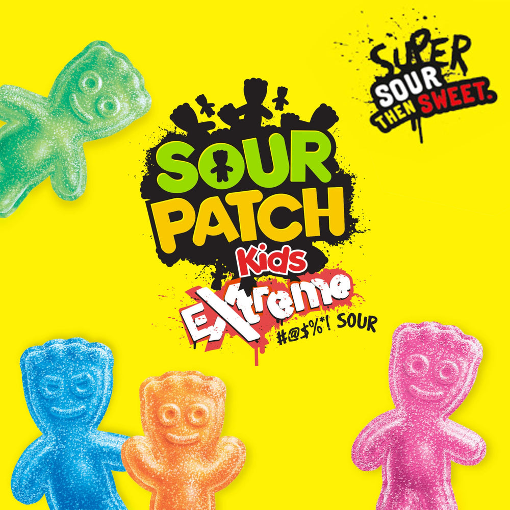 SOUR PATCH KIDS box next to a ruler for scale to show individual box size