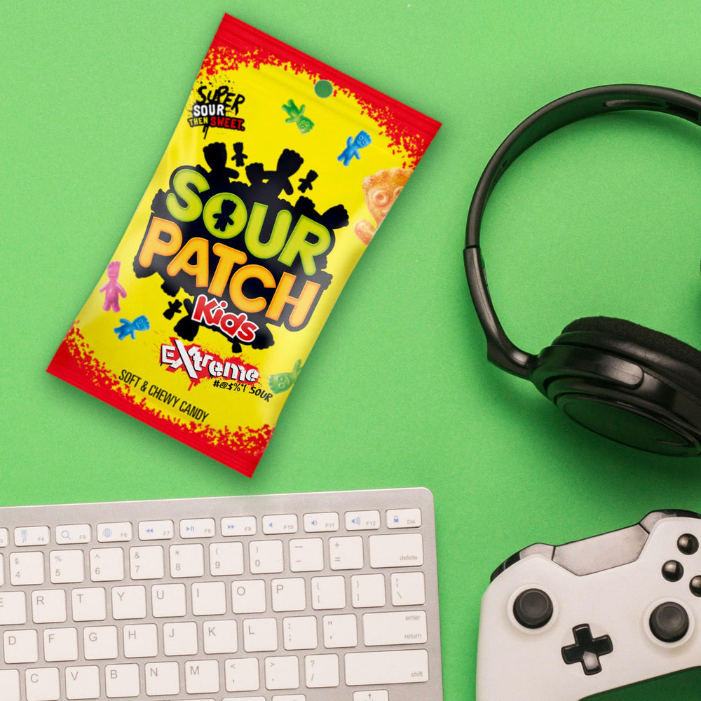 SOUR PATCH KIDS size comparison with ruler showing individual bag scale