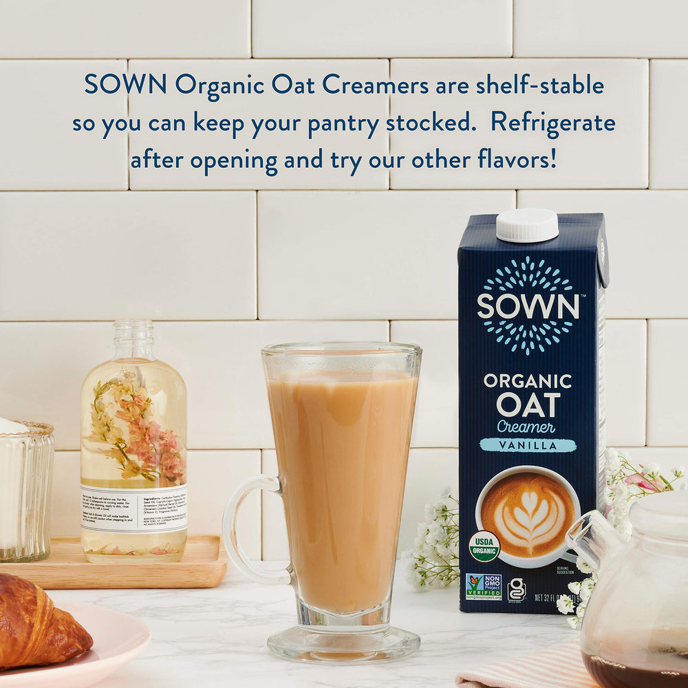 SOWN bottle beside a coffee mug to show 32oz scale and serving size
