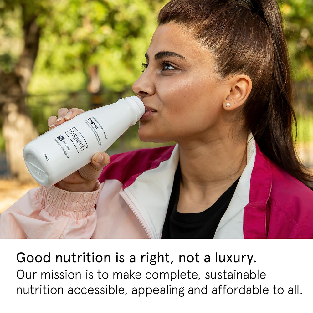 Soylent being poured to show creamy texture and easy drinking
