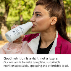 Soylent being poured to show creamy texture and easy drinking