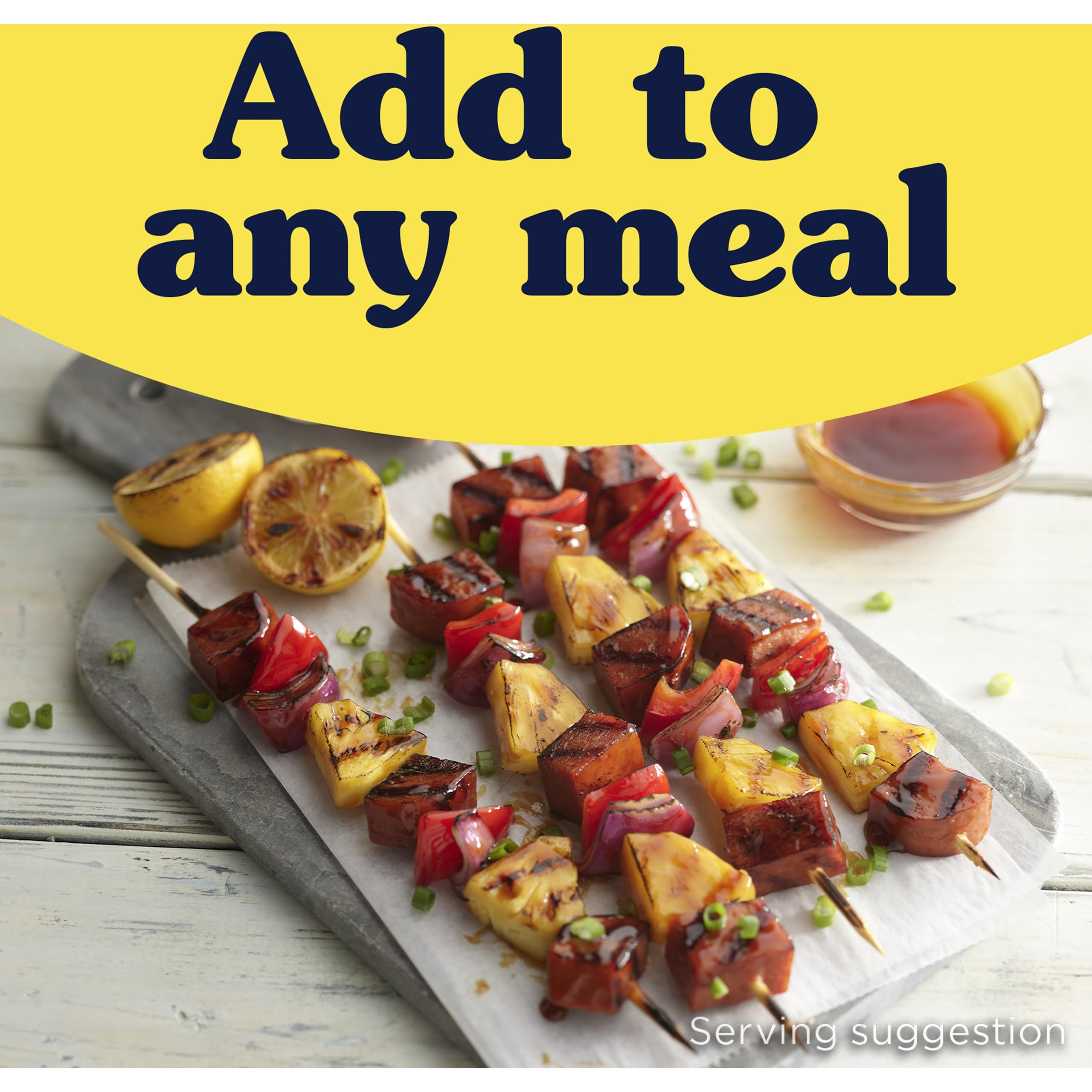 Seared SPAM Teriyaki slices on a pan highlighting crisp edges and savory appeal