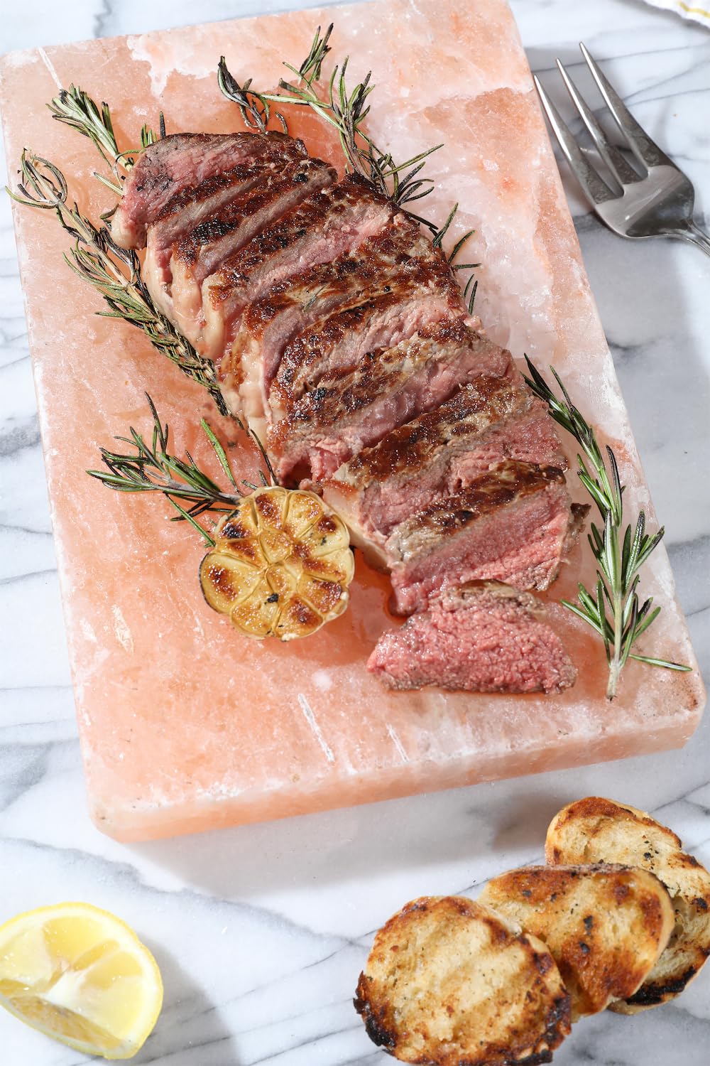 Spantik used as cutting board with chef slicing meat, convenient multiuse surface