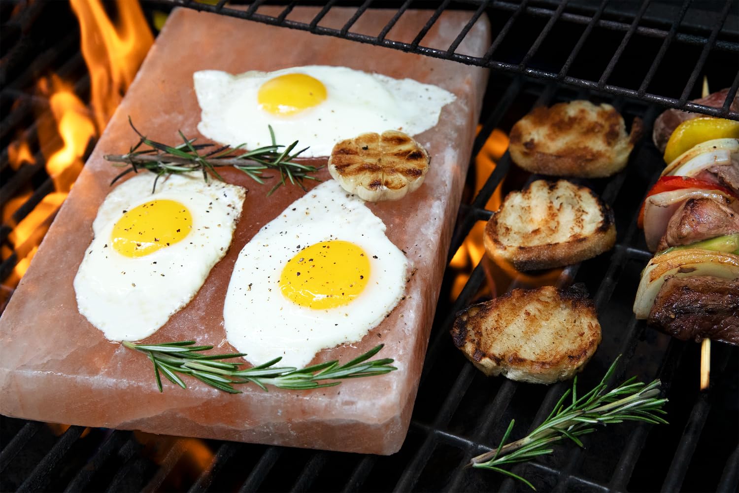 Spantik block heated on grill with searing food, demonstrates even high-heat cooking