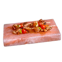 Spantik salt block front view showing smooth cooking surface and pink hue, enhances flavor