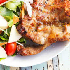 Spiceology pepper sprinkled on grilled steak adding bold flavor and finish