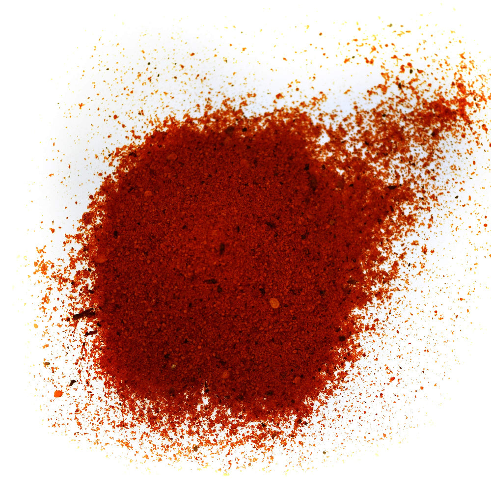 Spiceology seasoning sprinkled on grilled salmon illustrating caramelized sweet-heat