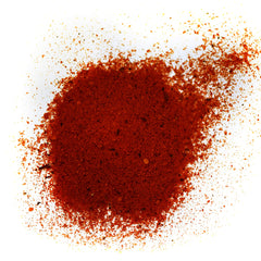 Spiceology seasoning sprinkled on grilled salmon illustrating caramelized sweet-heat