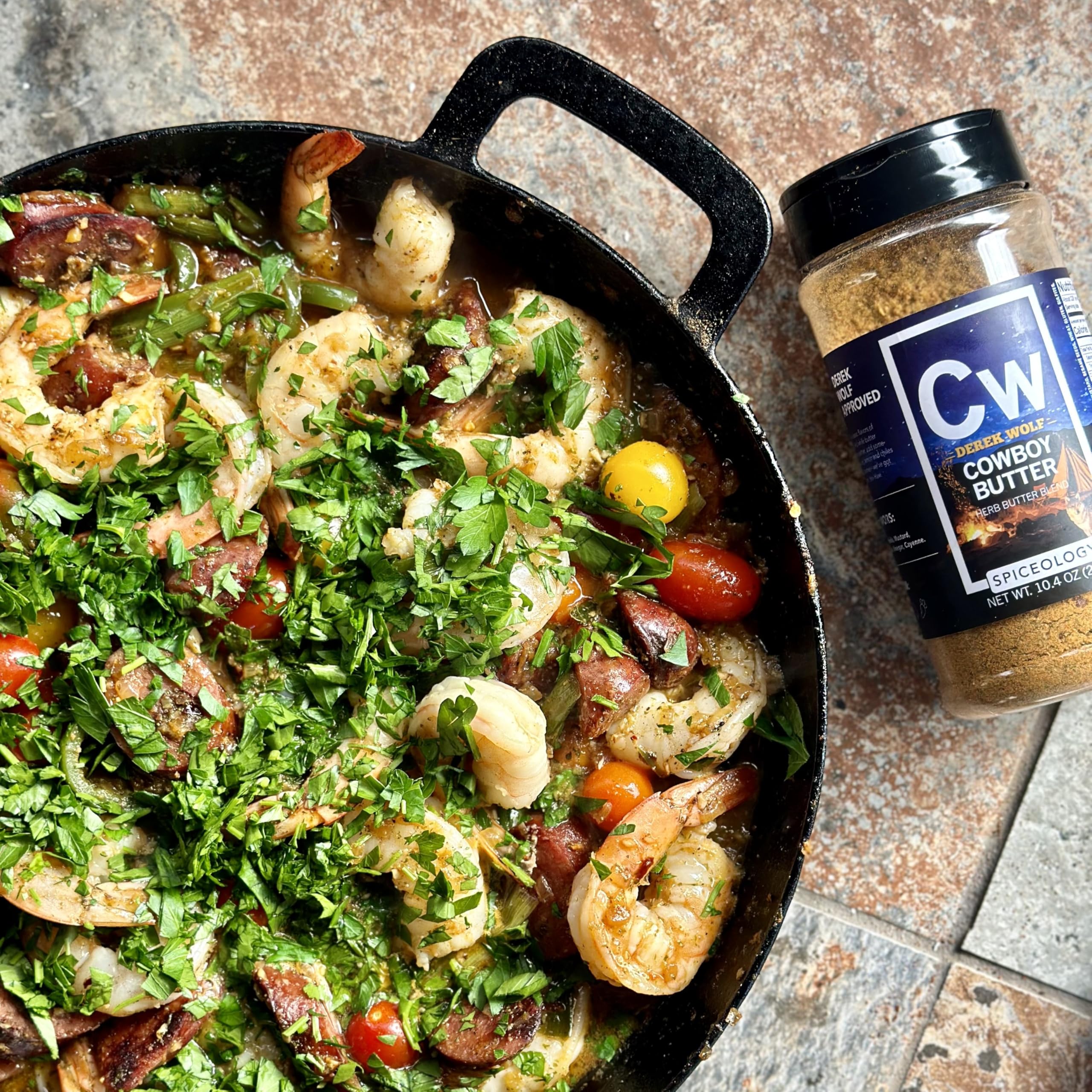 Roasted vegetables tossed in Spiceology Cowboy Butter highlighting smoky-savory boost benefit
