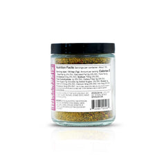 Close-up of lemon peel, pink peppercorns, and thyme pieces — Spiceology fresh ingredients visible