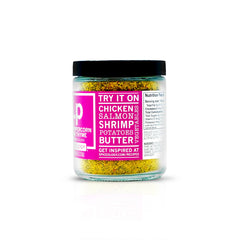 Wooden spoon scooping textured blend of Spiceology seasoning — easy to measure and use