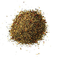 Spiceology sprinkled onto a baked pizza adding Italian herb aroma and color