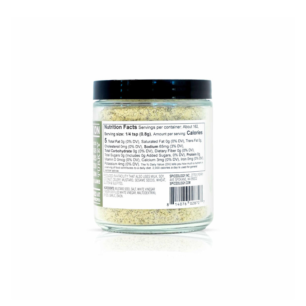 Close-up of rosemary flakes in Spiceology blend highlighting aromatic herbs