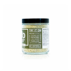 Open jar of Spiceology rosemary Dijon showing coarse ground herb and seed texture