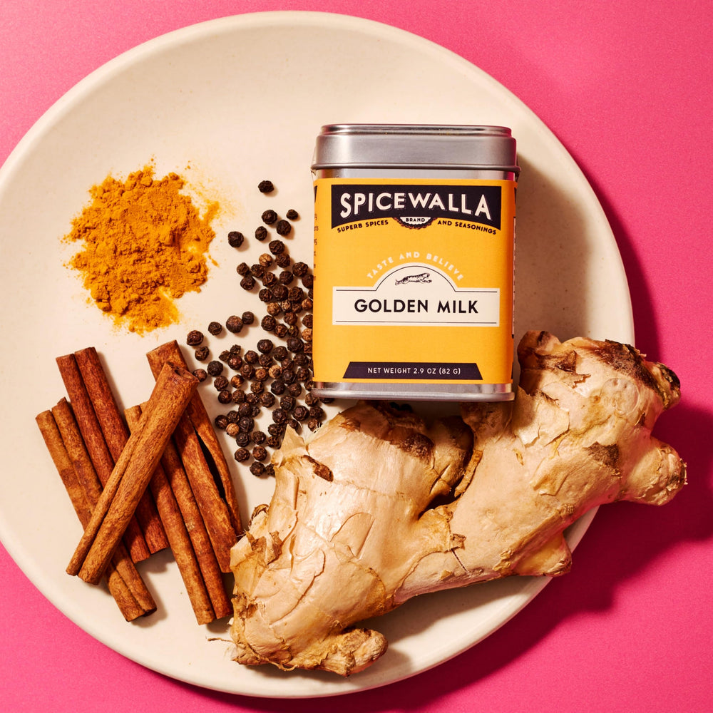SPICEWALLA scoop of golden milk powder highlighting easy portioning