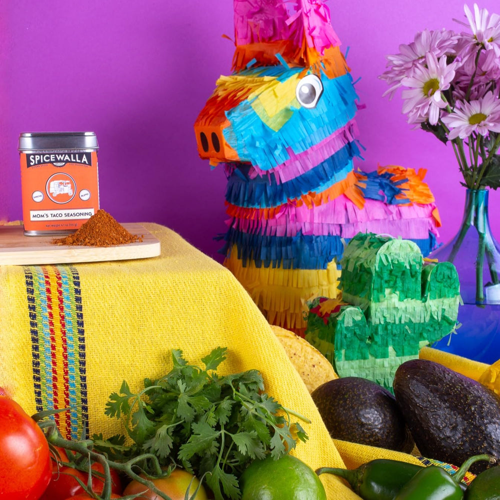SPICEWALLA seasoning on prepared tacos at table, simplifies taco night
