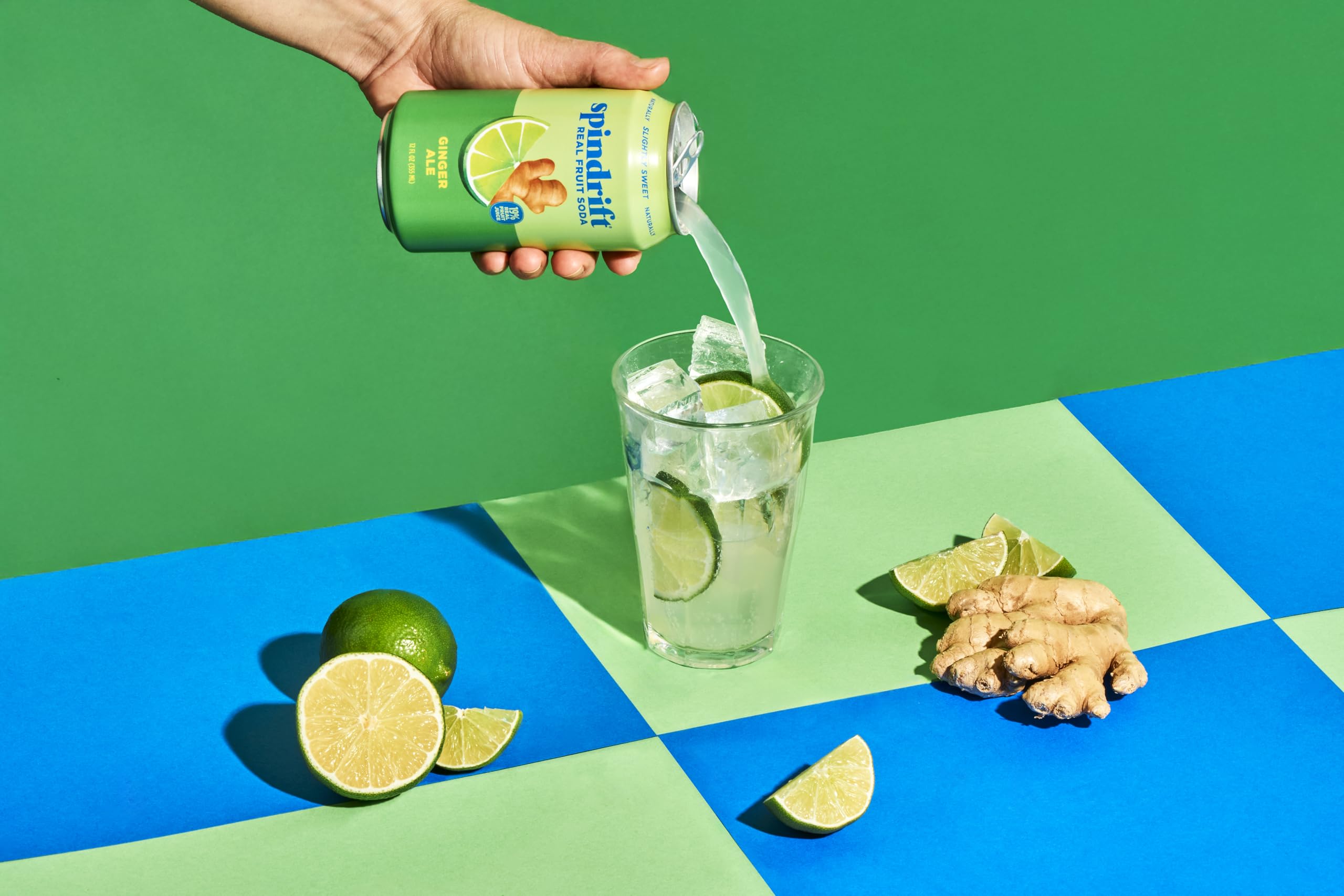 Spindrift ginger ale can beside a hand to show size and easy portability
