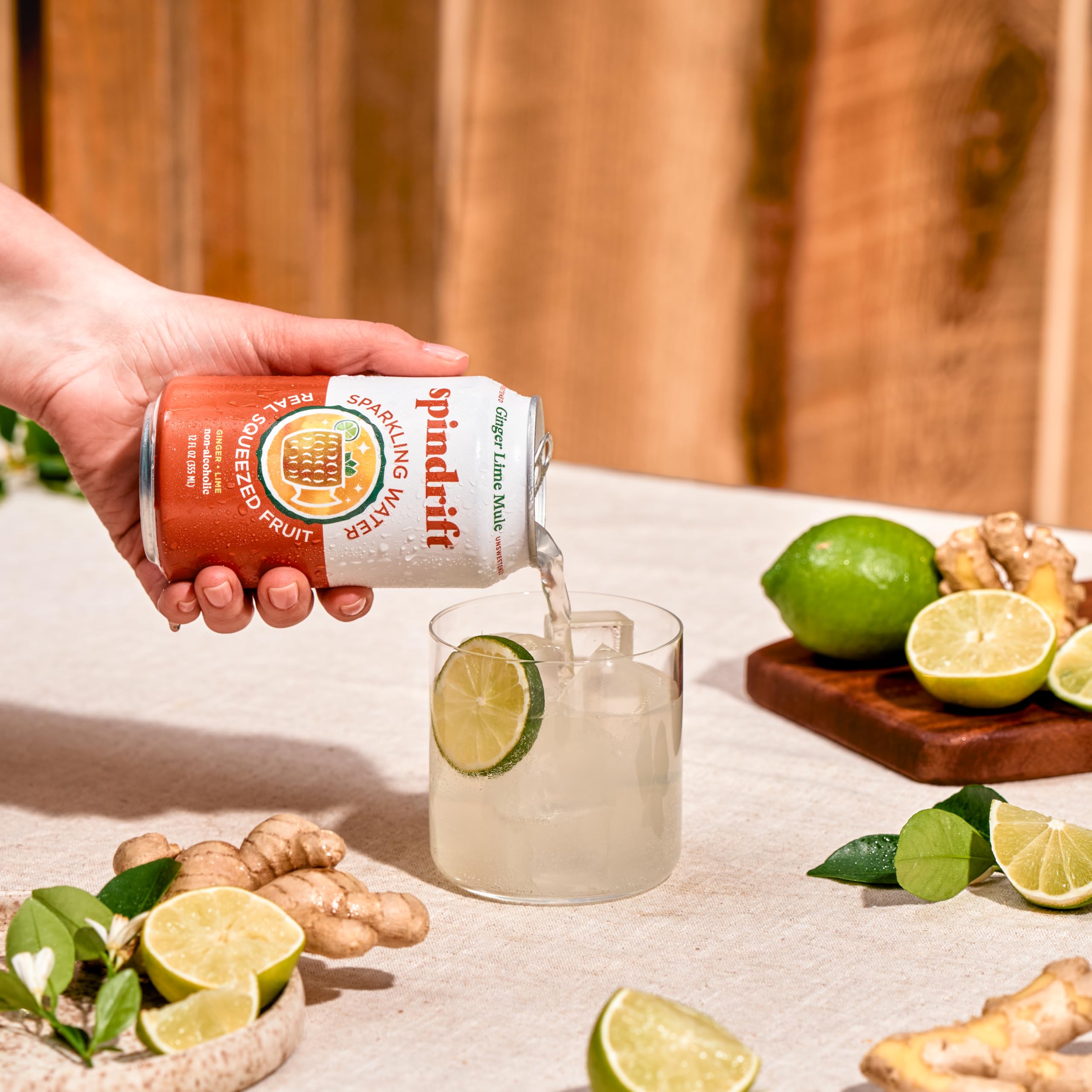 Spindrift Ginger Lime Mule can held in hand demonstrates portable low-calorie refreshment