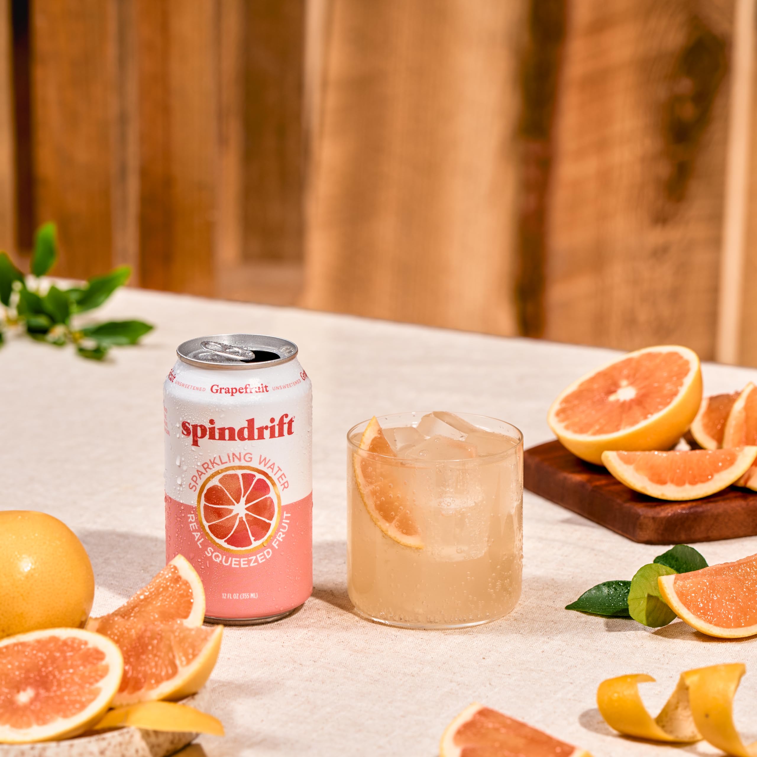 Spindrift grapefruit can held in hand for scale and convenient single-serve benefit