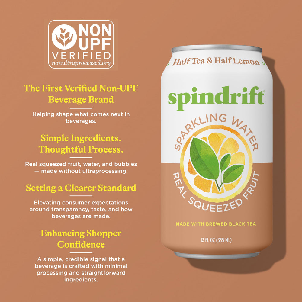 Glass of Spindrift over ice showing effervescence and citrus refreshment