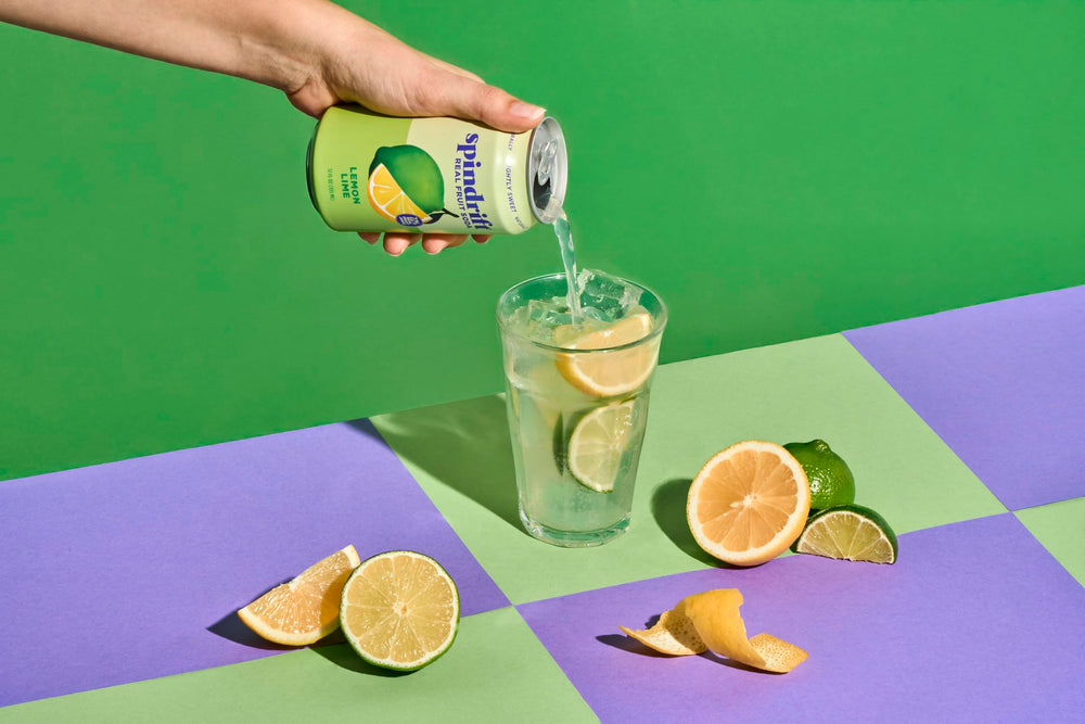 Spindrift lemon lime can held in hand for scale and convenient single-serve benefit