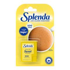SPLENDA dispenser with single tablet in hand for portable convenience