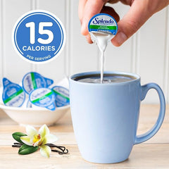 SPLENDA single-serve cups beside a standard mug to show portion size