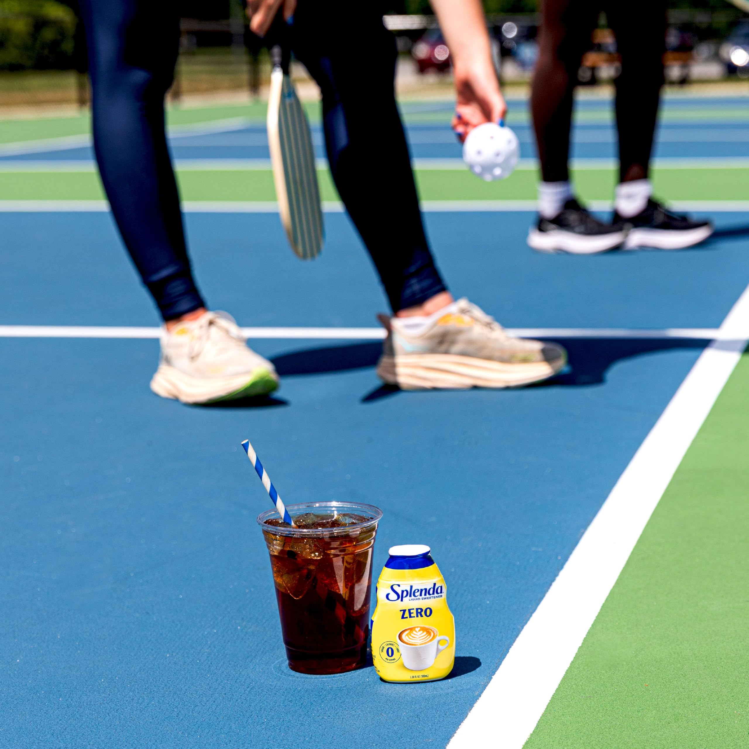 SPLENDA bottle in purse displaying on-the-go accessibility benefit