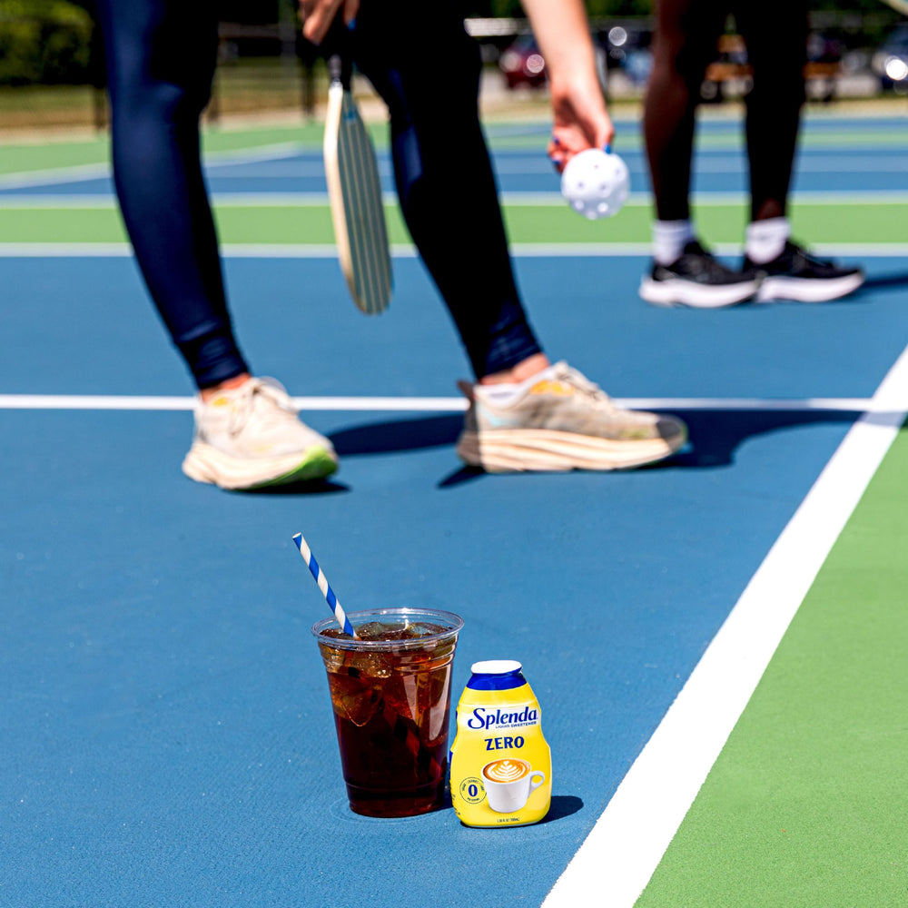 SPLENDA bottle in purse displaying on-the-go accessibility benefit