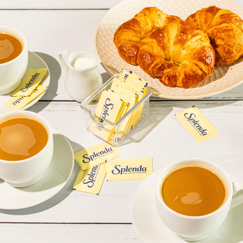 SPLENDA packets on office counter offering tidy breakroom sweetener