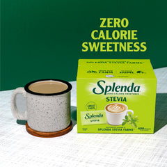 SPLENDA packets beside coffee cup dissolving quickly for consistent sweetness