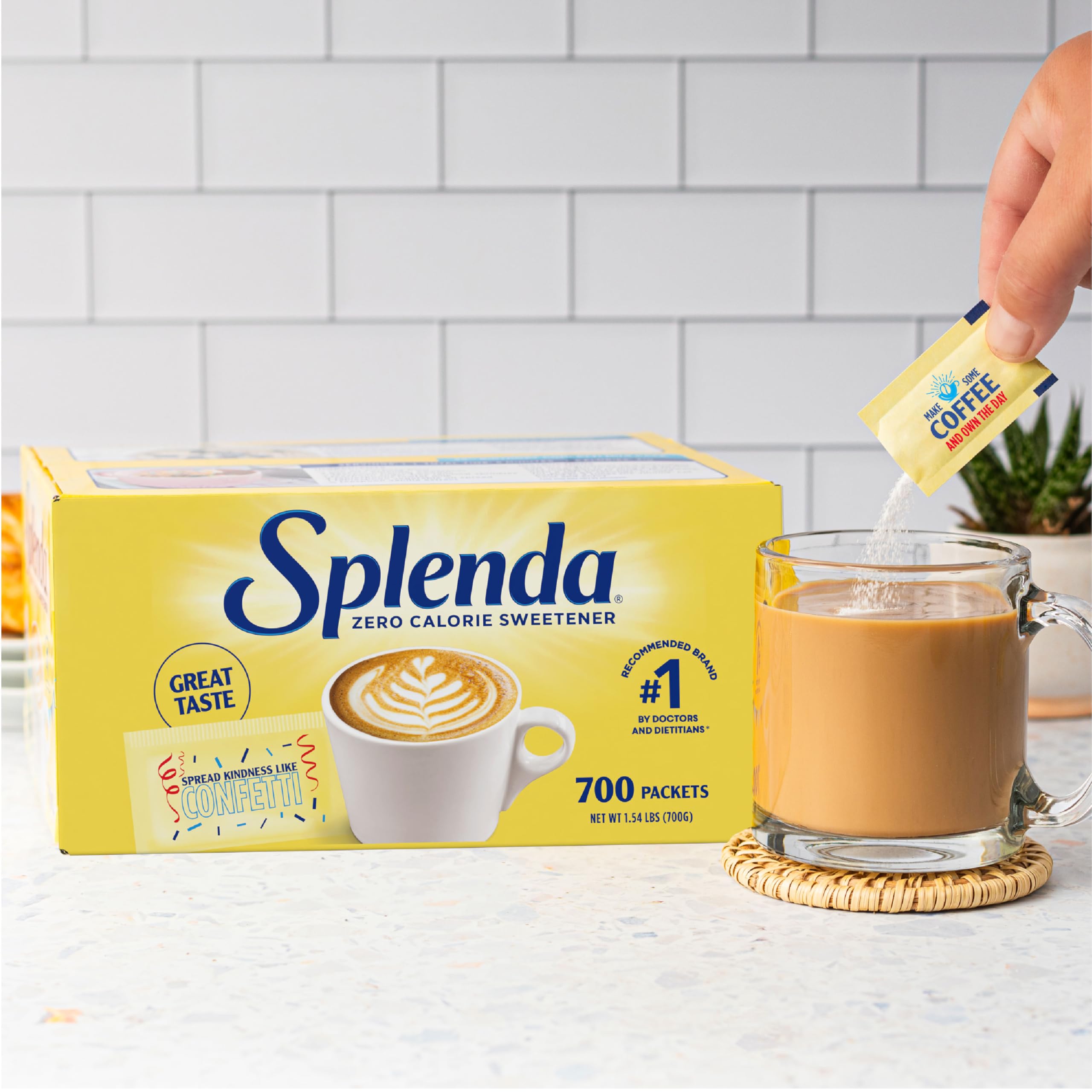 SPLENDA packet beside teaspoon for scale and portion clarity
