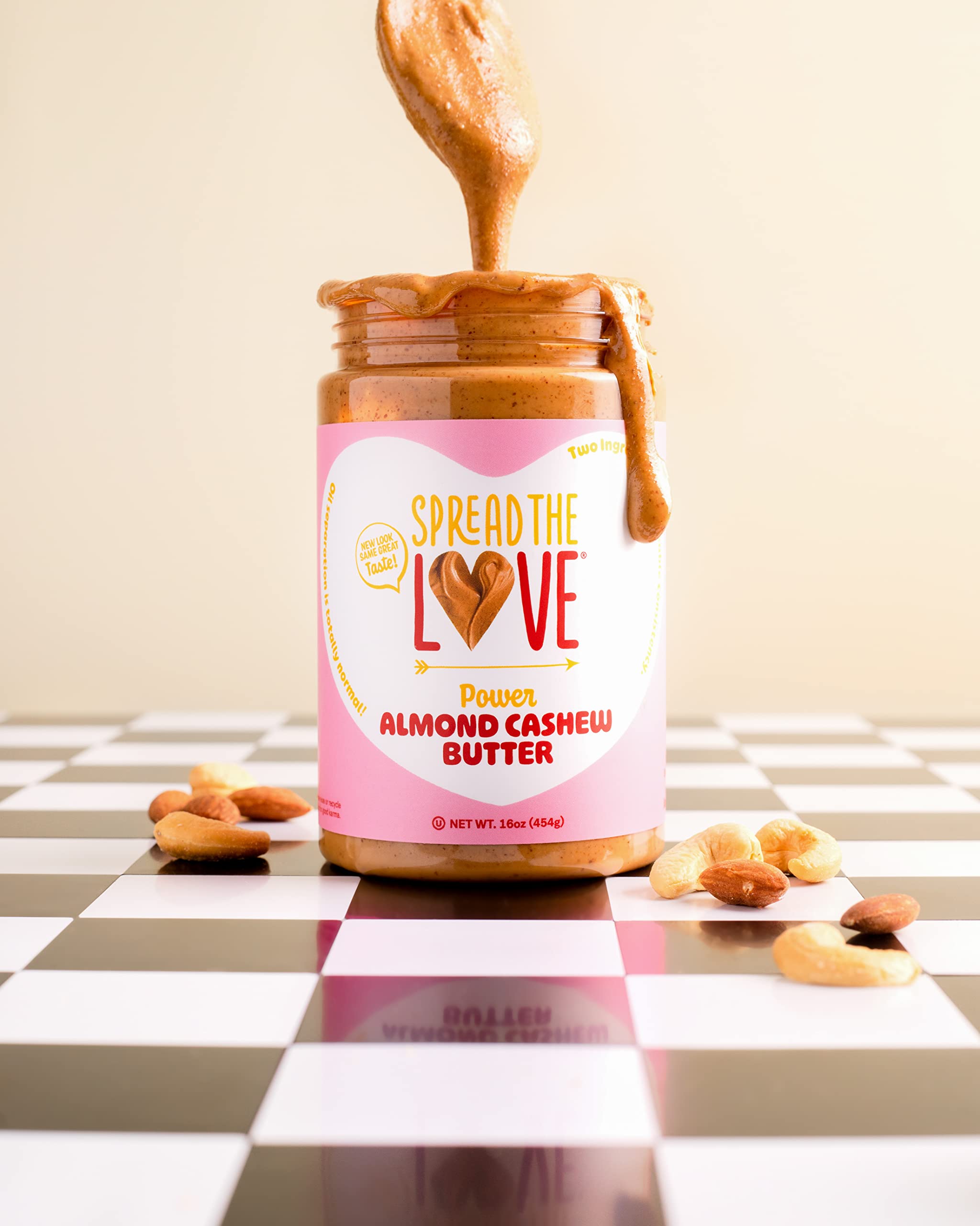 Spread The Love open jar with stirred oils, demonstrates easy to mix consistency