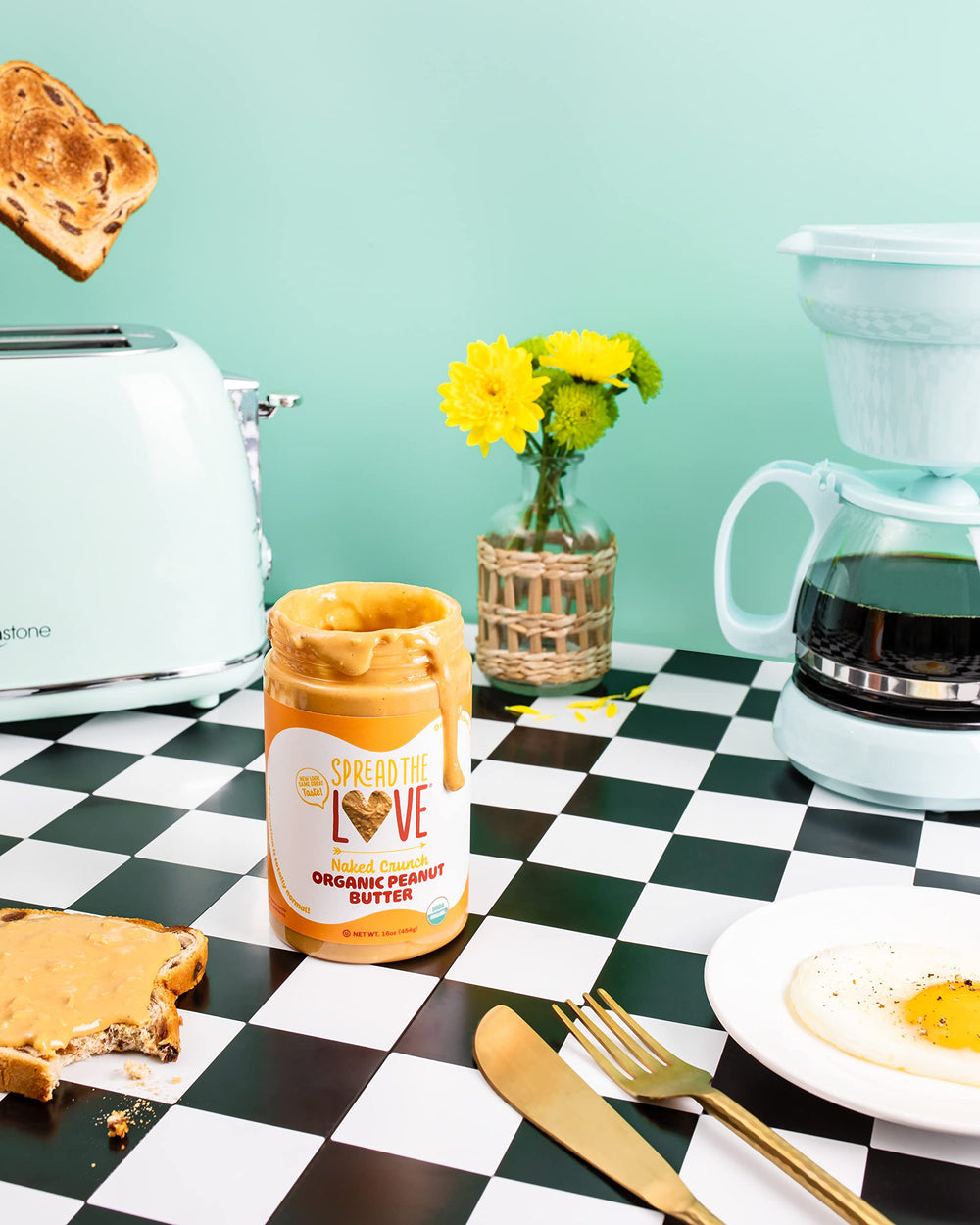 Label detail with organic badge on Spread The Love jar emphasizing clean ingredients