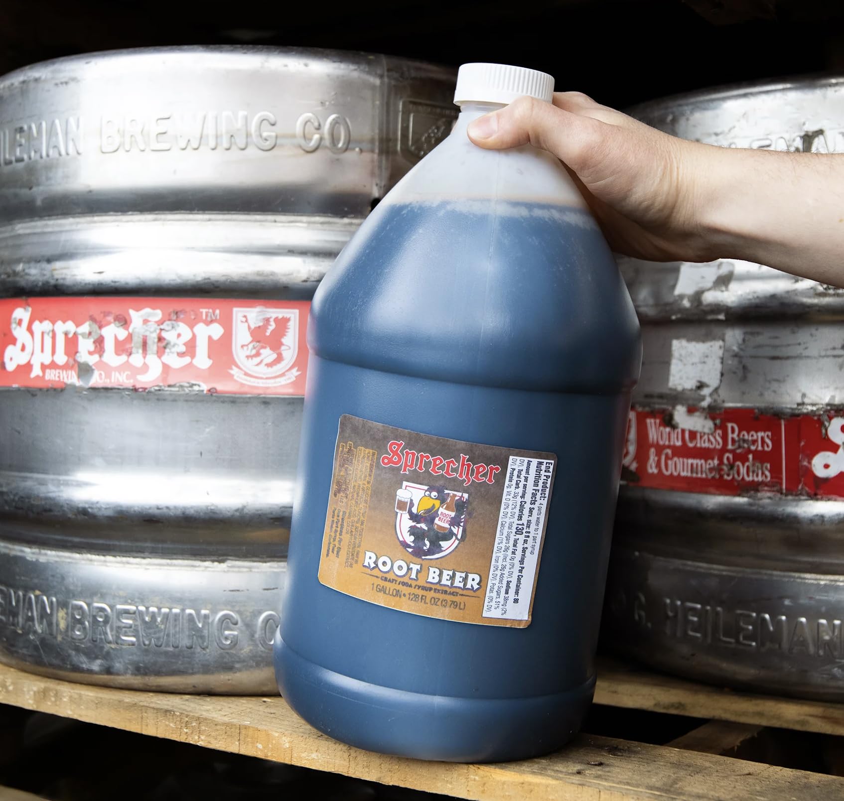 Northwestern Extract Sprecher next to a five-gallon keg for scale and yield clarity