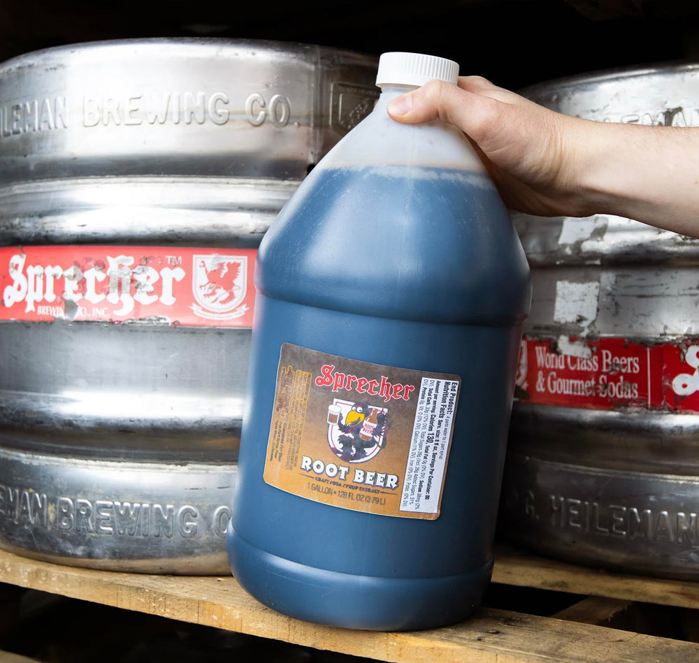 Northwestern Extract Sprecher next to a five-gallon keg for scale and yield clarity