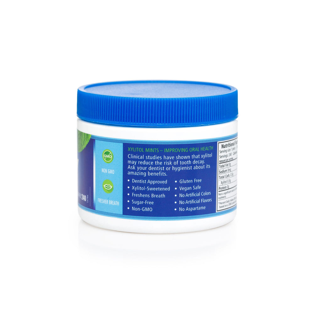 Spry open tin with mints spilled out showing convenient on-the-go access