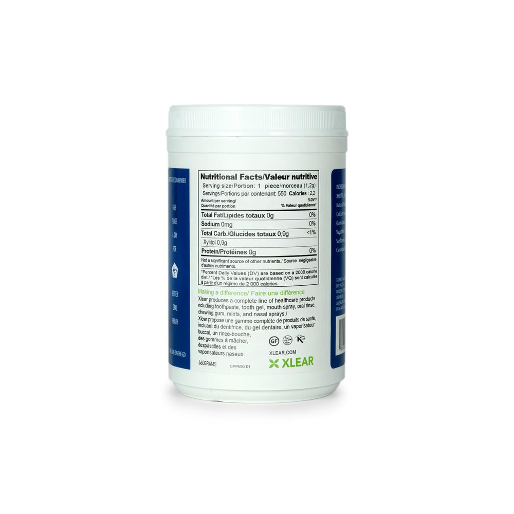 hand holding Spry tub to show scale and portable size for travel convenience