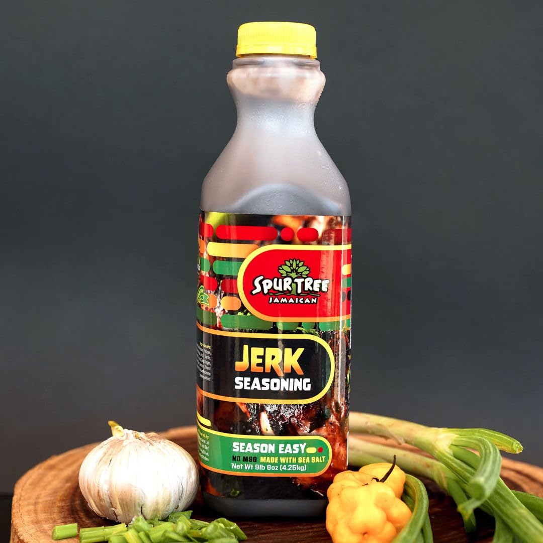 Spur Tree ingredients flatlay with scallion, scotch bonnet, garlic for freshness