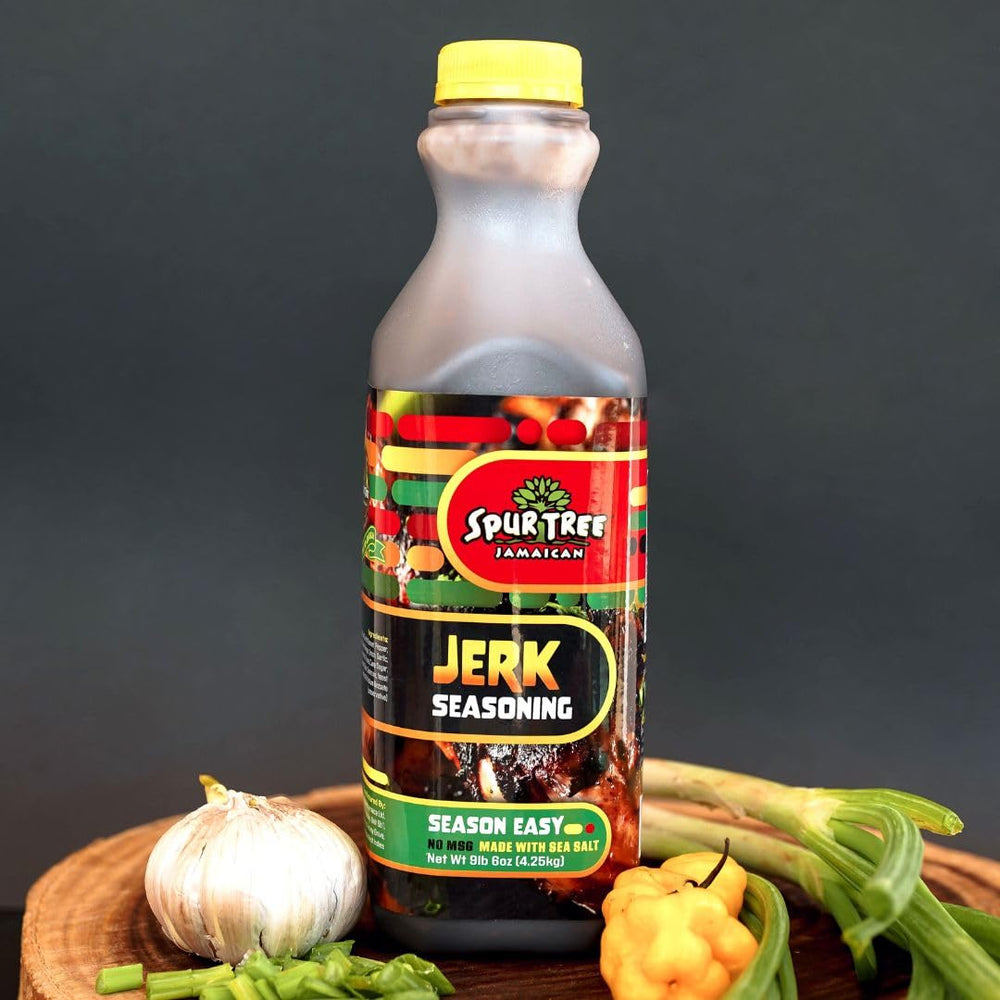 Spur Tree ingredients flatlay with scallion, scotch bonnet, garlic for freshness