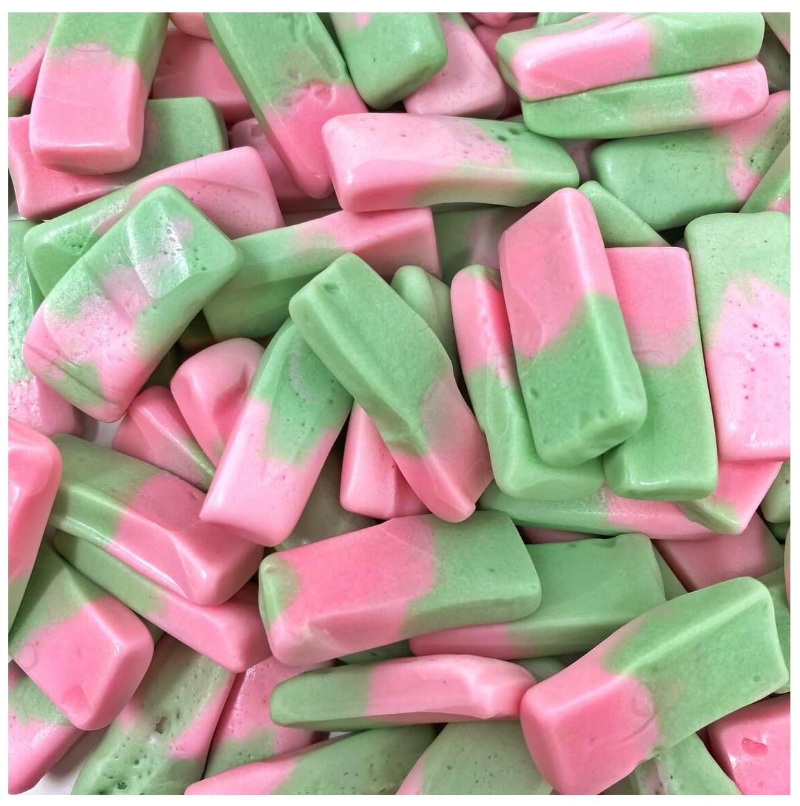 Hand holding a Squashies pouch demonstrating the 120g size and portability