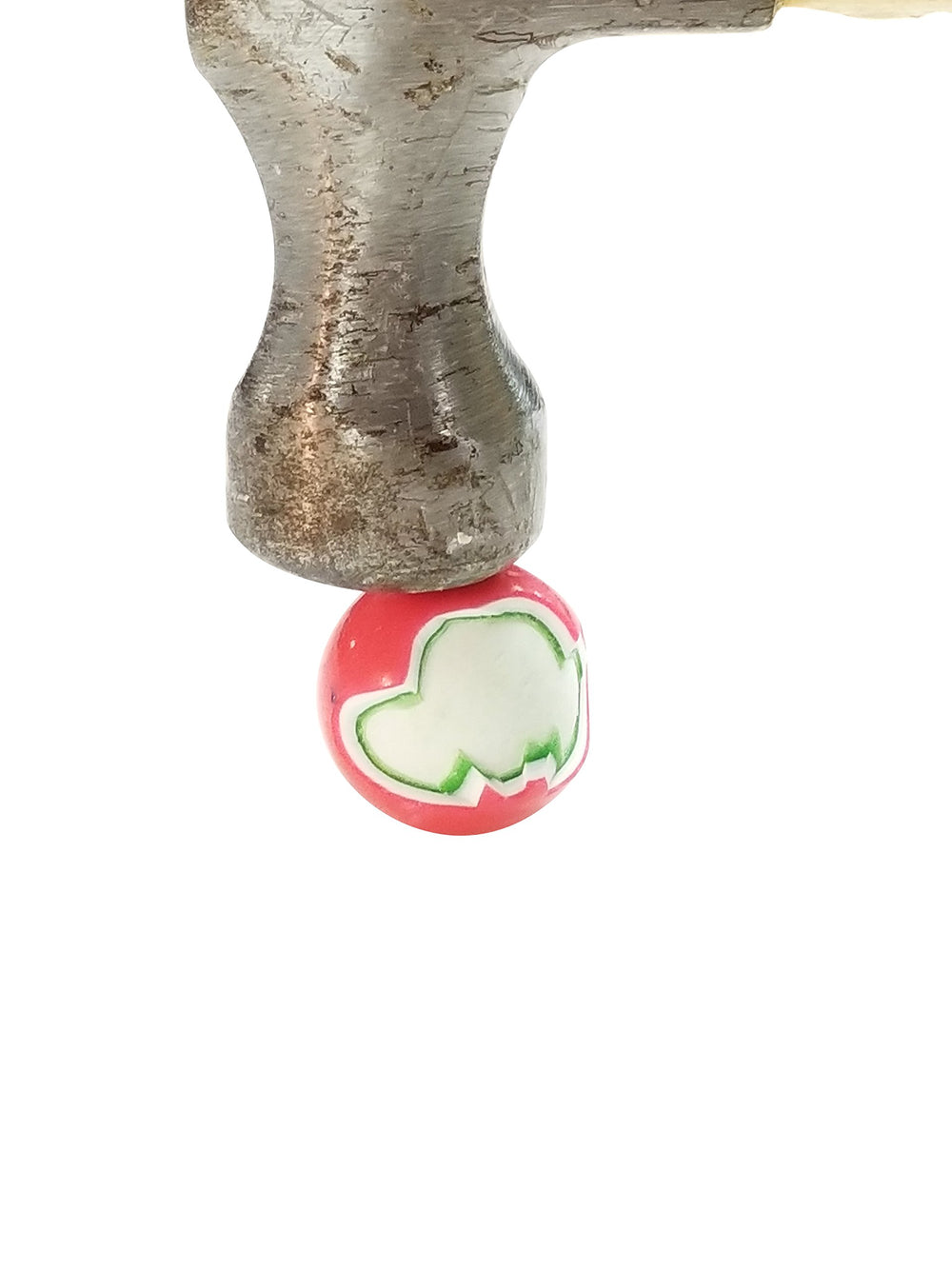 Squireboone jawbreaker next to a quarter showing size clarity and portion planning benefit