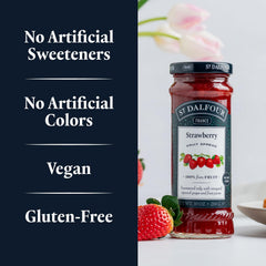 Open St. Dalfour jar with spoon showcasing spread consistency and sheen