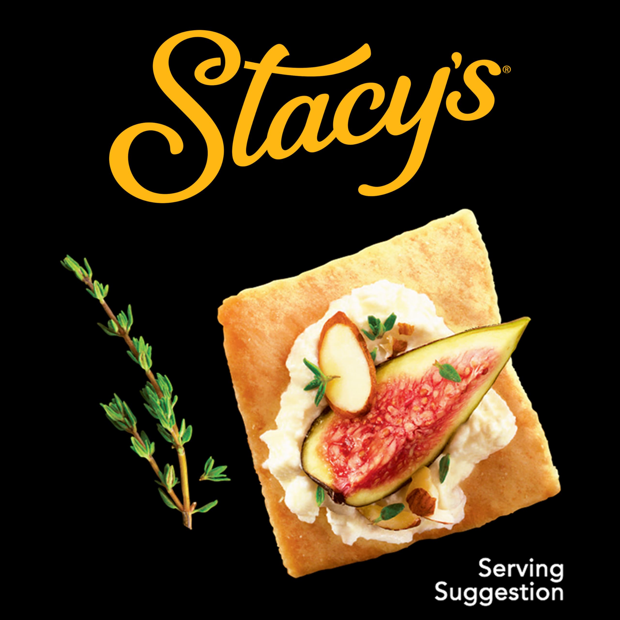Stacy's pita chips served with hummus dip, versatile pairing for flavor enhancement
