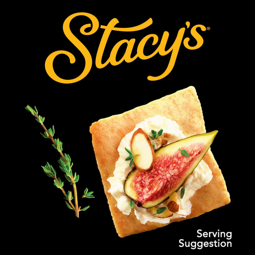 Stacy's pita chips served with hummus dip, versatile pairing for flavor enhancement