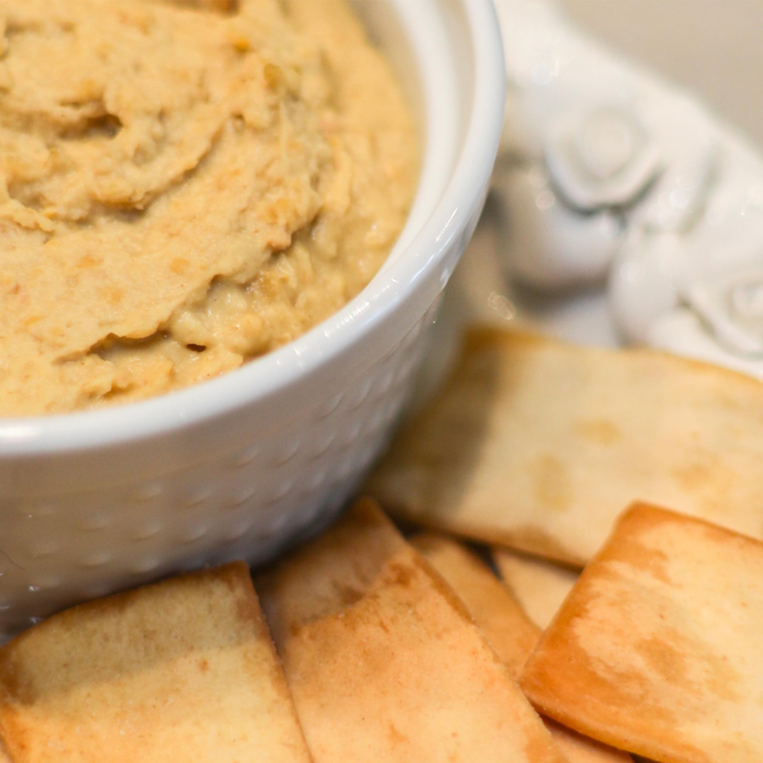 Stacy's pita thins on a party table illustrating crowd-pleasing snack option