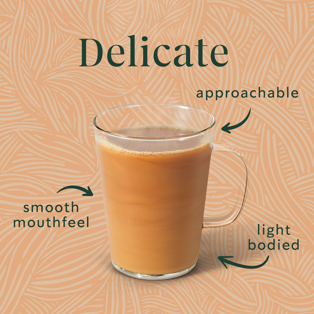 Starbucks iced coffee being poured over glass with ice, refreshing cold-brew option