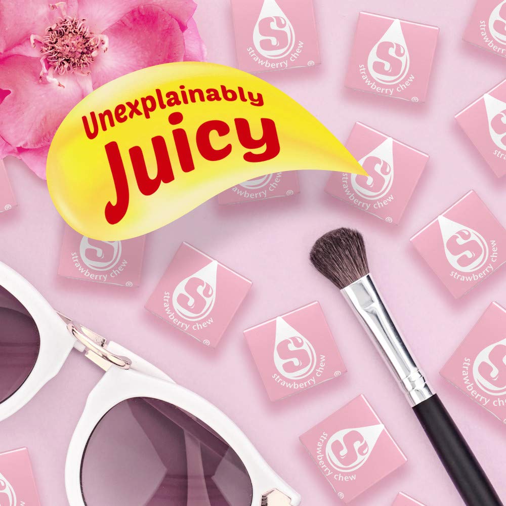 Starburst individually wrapped pieces in hand for hygienic sharing convenience