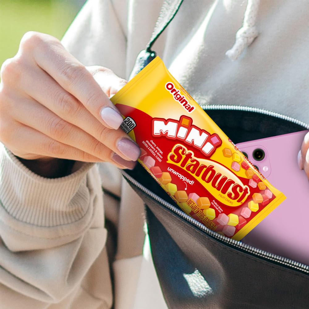 Starburst pouch held in hand showing compact size and portable convenience